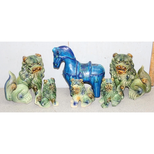 1803 - Box of Chinese style ceramics to include 5 dogs of Foo and a pottery Tang horse