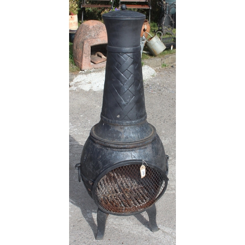 349 - Cast iron chimenea or burner, approx 140cm tall