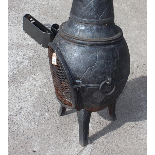 349 - Cast iron chimenea or burner, approx 140cm tall