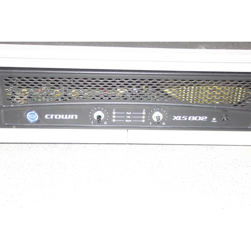 764 - Crown XLS 802 professional 1000W rack mounted power amp, with hard shell carry case