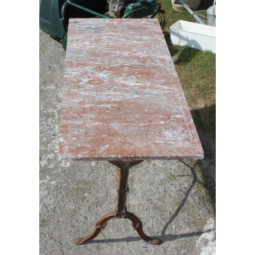 355 - A vintage marble topped garden table with distressed metal base, approx 107cm wide x 48cm deep x 70c... 