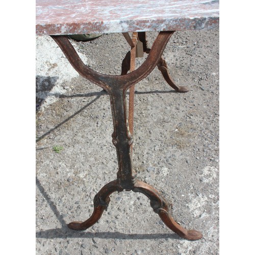 355 - A vintage marble topped garden table with distressed metal base, approx 107cm wide x 48cm deep x 70c... 