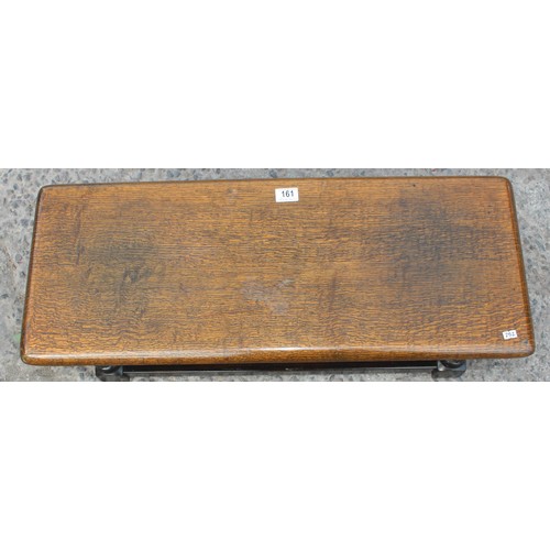 161 - A small vintage oak stool or foot rest, approx 83cm wide