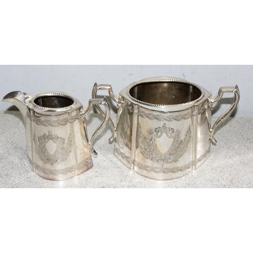 1004 - A Victorian silver plated 4 piece tea set with engraved decoration