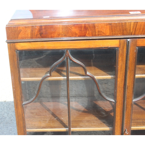 106 - An early 20th century mahogany display cabinet or bookcase, approx 88cm wide x 32cm deep x 135cm tal... 