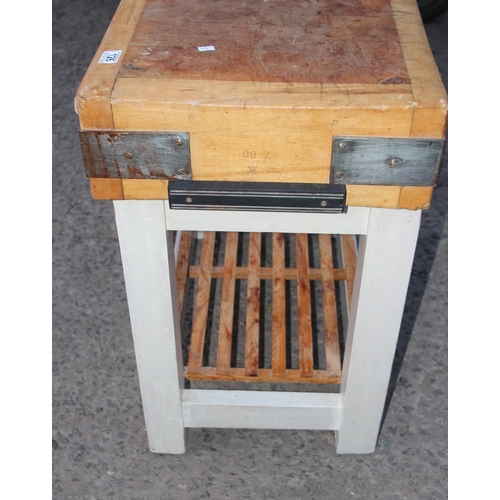 126 - A vintage butchers block table on wooden stand by Charles L Dix of Norwich, approx 77cm wide x 46cm ... 