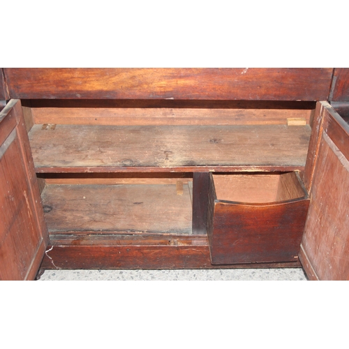 128 - An antique mahogany sideboard with 2 doors and drawer, approx 107cm wide x 39cm deep x 86cm tall