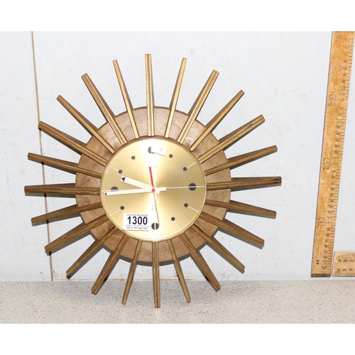 1300 - Retro sunburst clock by Smiths with Quartz movement, approx 39cm diameter