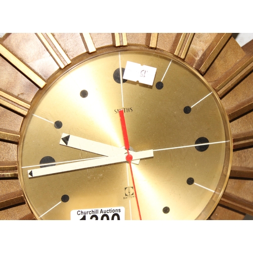 1300 - Retro sunburst clock by Smiths with Quartz movement, approx 39cm diameter