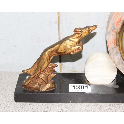 1301 - Art Deco period mantel clock with circular marble face and a leaping hound, approx 41cm wide