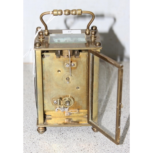 1302 - Vintage French mechanical carriage clock with key in tooled leather travelling case