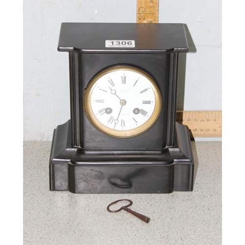 1306 - An antique slate cased mantel clock with mechanical movement, the enamel dial marked for Payne & Son... 