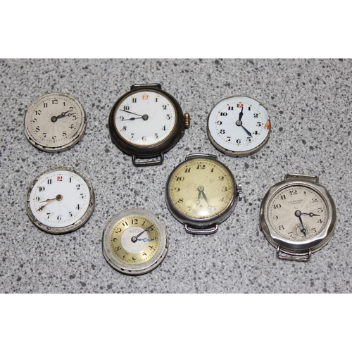 1310 - Collection of seven trench type Swiss watch movements - 3 in cases including a silver cased hallmark... 