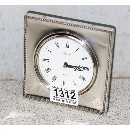 1312 - Tregawne hallmarked silver framed desk clock with green leather textured backing