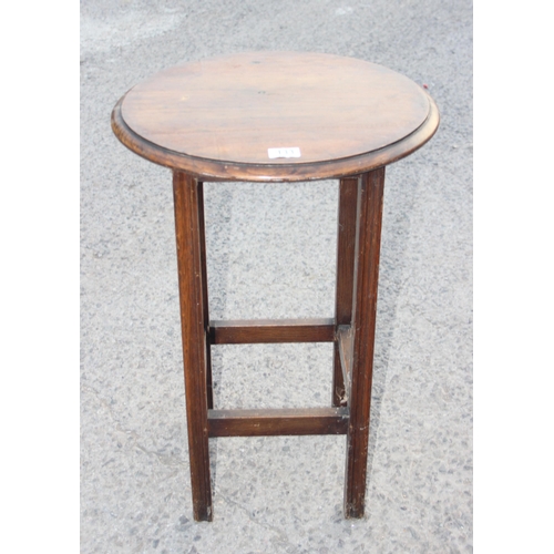 133 - A small vintage round oak topped table, approx 46cm in diameter x 68cm tall