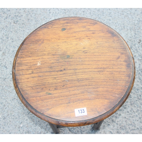 133 - A small vintage round oak topped table, approx 46cm in diameter x 68cm tall