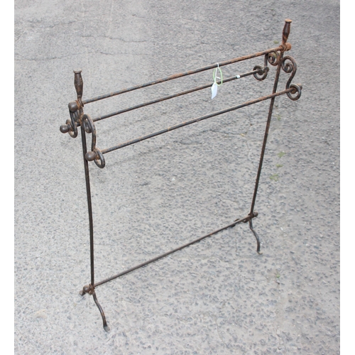 140 - Vintage wrought iron towel rail, approx 86cm wide x 25cm deep x 100cm tall