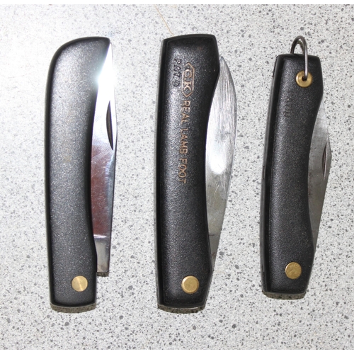 1409 - 3 black-handled folding knives, to incl a Whitby, CK lamb's foot, and a CK 9069