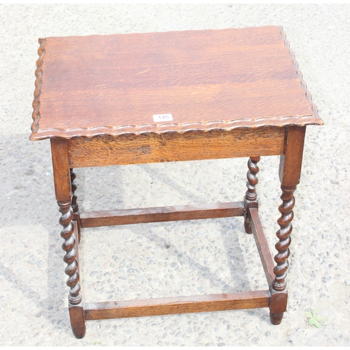 145 - A small oak table with barleytwist legs, approx 61cm wide x 45cm x 65cm