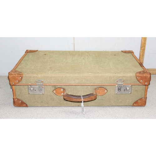 1450 - Military issue green canvas and leather trim demob suitcase - crows foot stamp to interior