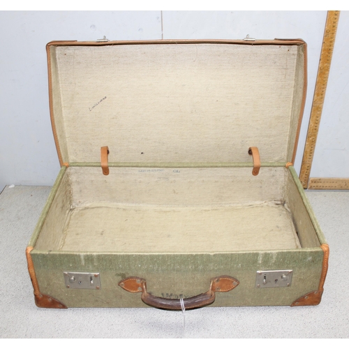 1450 - Military issue green canvas and leather trim demob suitcase - crows foot stamp to interior