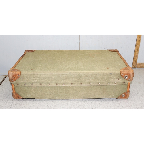 1450 - Military issue green canvas and leather trim demob suitcase - crows foot stamp to interior