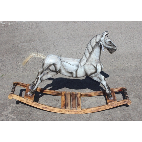 1508 - An antique style grey painted wooden rocking horse, approx 122cm wide