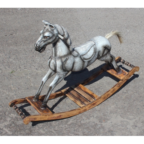 1508 - An antique style grey painted wooden rocking horse, approx 122cm wide