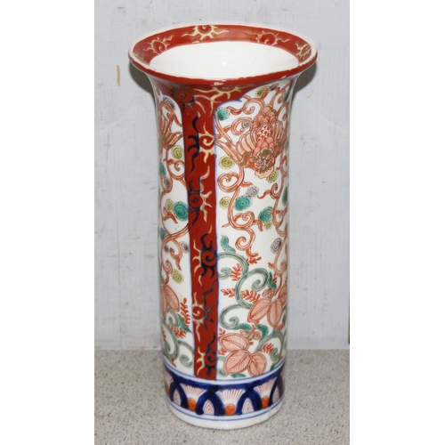 1620 - A pair of Oriental sleeve vases decorated in the Imari palette, likely early 20th century, character... 