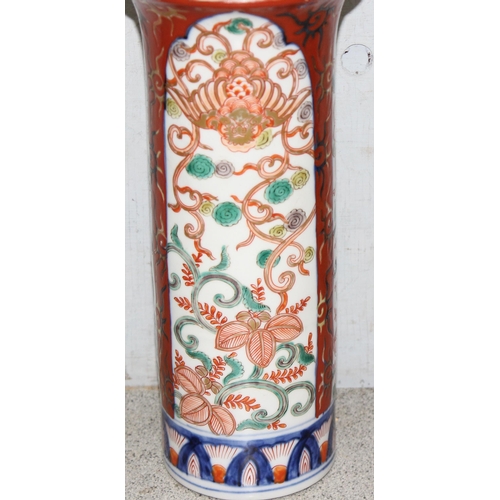 1620 - A pair of Oriental sleeve vases decorated in the Imari palette, likely early 20th century, character... 