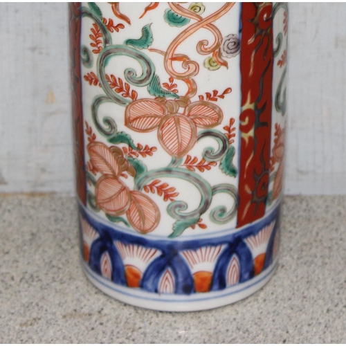 1620 - A pair of Oriental sleeve vases decorated in the Imari palette, likely early 20th century, character... 