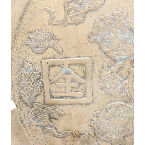 1622 - A large heavy Chinese polished bronze or brass mirror decorated with moulded characters to reverse, ... 