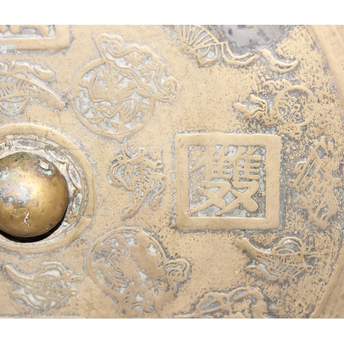 1622 - A large heavy Chinese polished bronze or brass mirror decorated with moulded characters to reverse, ... 