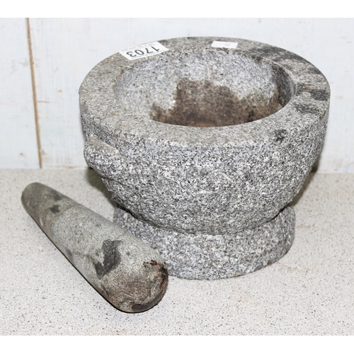 1703 - A large granite pestle and mortar, approx 20cm in diameter