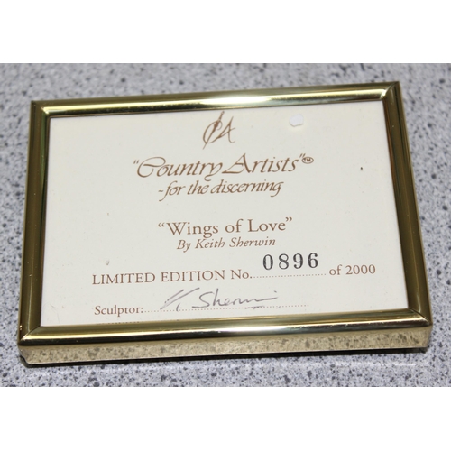 1733 - 2 Country Artists figures model 04902 and 04903 entitled 'Wings of love' and 'Sapphire & Gold' with ... 