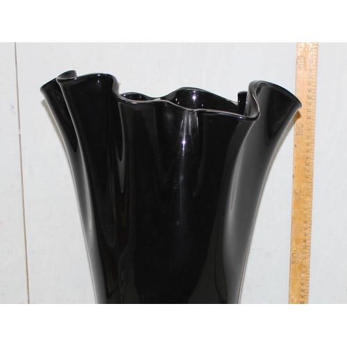 1737 - Large black glass vase with handkerchief style top design, approx 60cm tall