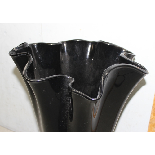 1737 - Large black glass vase with handkerchief style top design, approx 60cm tall