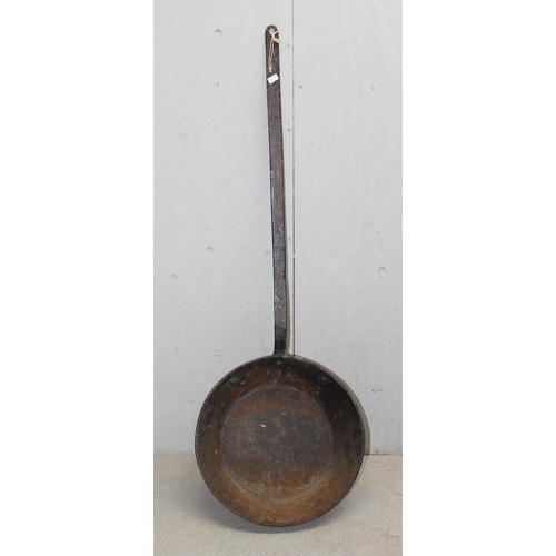 1743 - A large enamel cooking pot, approx 35cm in diameter, and a long handled metal frying pan (2)