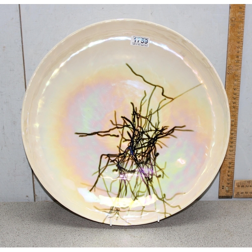 1759 - Large iridescent glass charger with contemporary asymmetric branch design, approx 41cm diameter