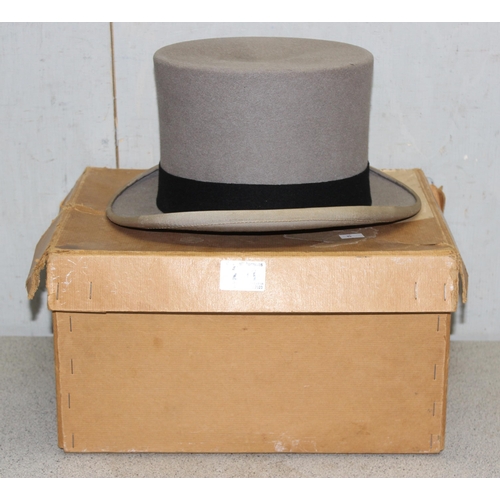 201 - A vintage Lock & Co grey top hat in original box, no size but on the smaller size