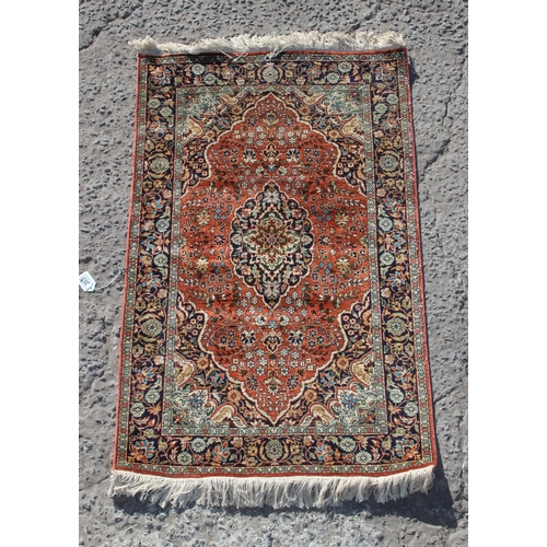 203 - A highly decorative silk Persian Kashan style rug with label verso, one of a pair matching lot 204, ... 