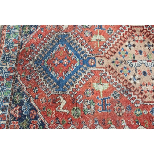 207 - A vintage Persian Yalameh rug decorated with animals, approx 146cm x 104cm