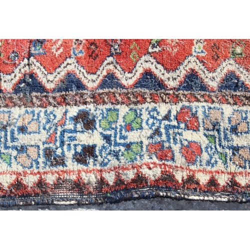 207 - A vintage Persian Yalameh rug decorated with animals, approx 146cm x 104cm