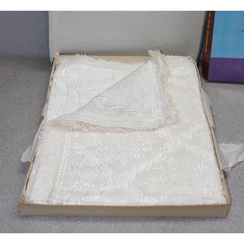 221 - Boxed set of white table linen & a boxed Japanese bed throw measuring approx 240cm x 200cm