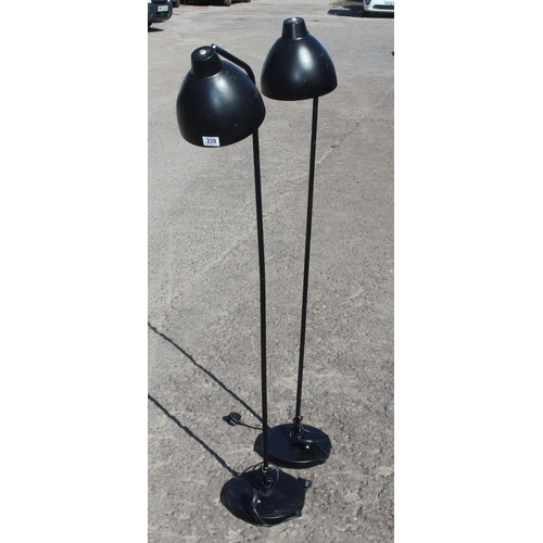 239 - A pair of retro style black floor standing lamps, approx 146cm tall