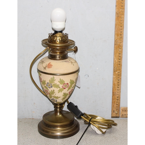 246 - Converted to electricity Messengers oil lamp with floral decoration with glass shade, approx 38cm