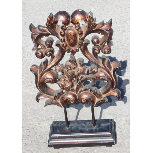 281 - 3 unusual highly decorative sculptures on stands, each approx 72cm tall