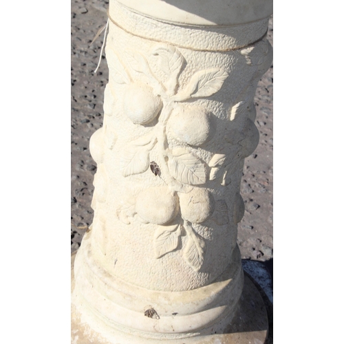 311 - A weathered garden stone birdbath, approx 68cm tall