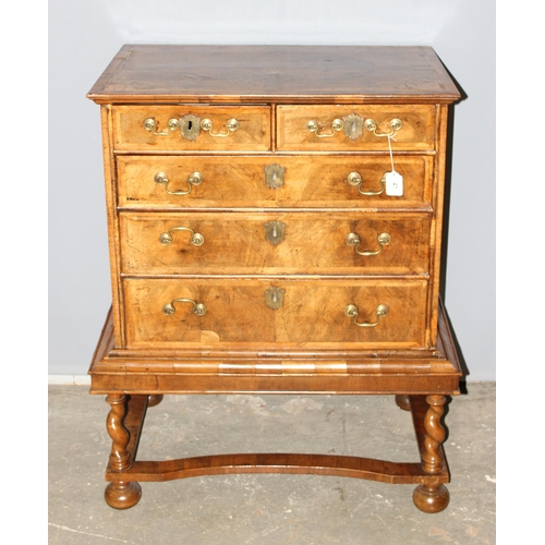 41 - A William & Mary or Queen Anne period c.1700 walnut veneer and feather-banded chest on stand of unus... 