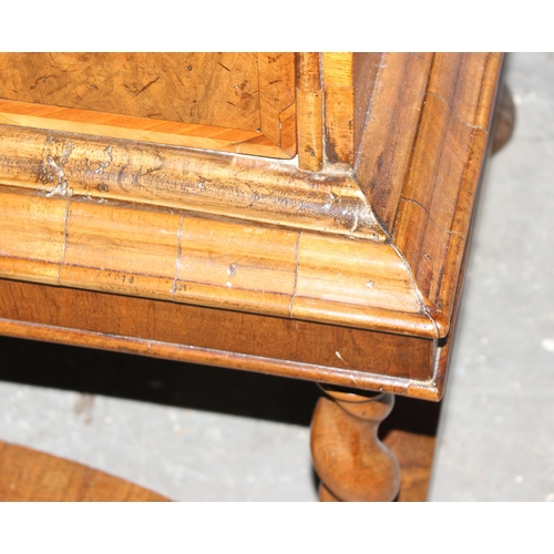 41 - A William & Mary or Queen Anne period c.1700 walnut veneer and feather-banded chest on stand of unus... 